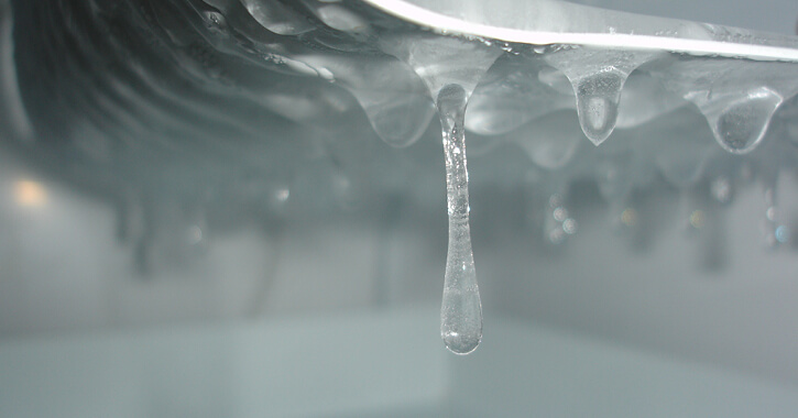 Close-up of frozen water drops in ice maker