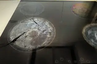 Cracked glass stovetop.